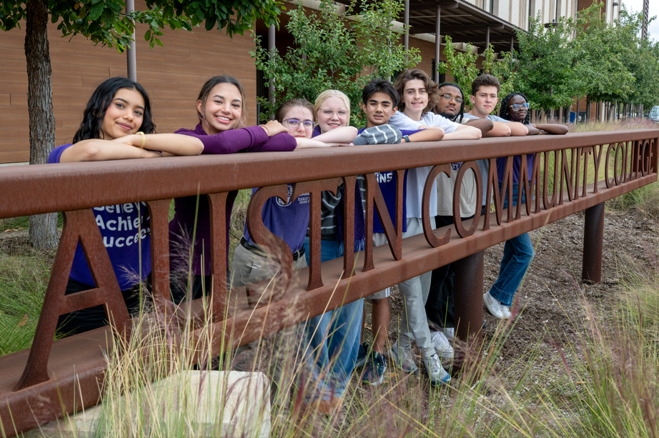 Students Stand outside of Austin Community College at Early College High School. "Helping ECHS provide the best educational experience possible, encouraging family and community involvement, and enabling our scholars to learn and grow to their full potential."
